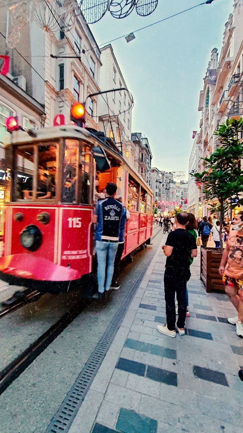 Nostalgic red tram on Istiklal Street, Istanbul by Mohammad Khakpaki