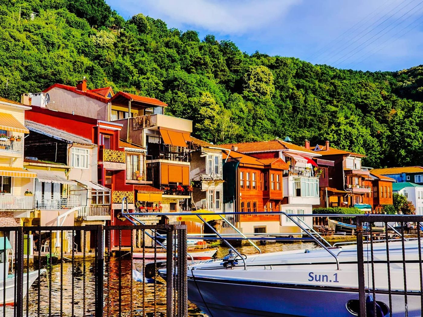 Colourful waterfront houses and boats, Istanbul by Mohammad Khakpaki
